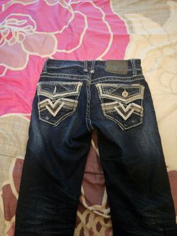 Salvage buckle jeans