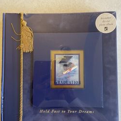 Graduation keepsake scrapbook. Still in original packaging. Pick up in Tigard.