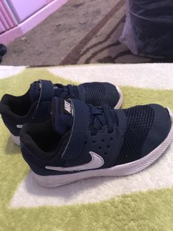 Nike’s blue size 9 child gray 12 child