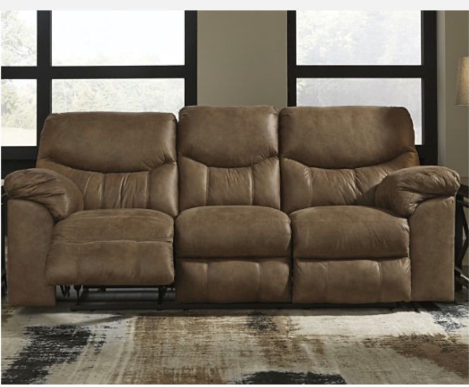 Leather couch with built in recliners