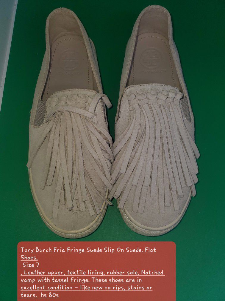 Tory Burch Fria Fringe Suede Slip On Suede. Flat Shoes.

Size 7

. Leather upper, textile lining, rubber sole. Notched vamp with tassel fringe. These 
