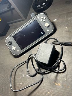 Nintendo switch lite w/case 128gb card