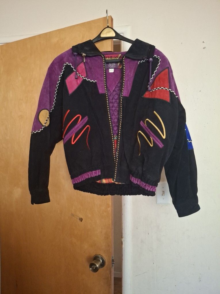 Club 66 By Tip Top Of California Suede coat size large.
multi color