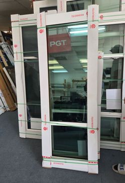 Brand New 25W x 70.5H PGT WinGuard Vinyl Impact Windows