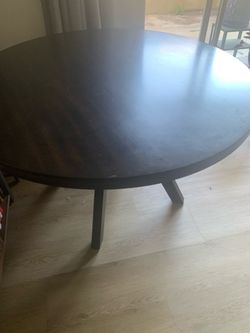Dark brown round dining table 48”