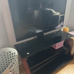 Tv with a Tv stand