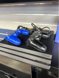 Sony PS4 Pro 1TB with 2 Wireless Controllers, Charging Station Power and HDMI Cords