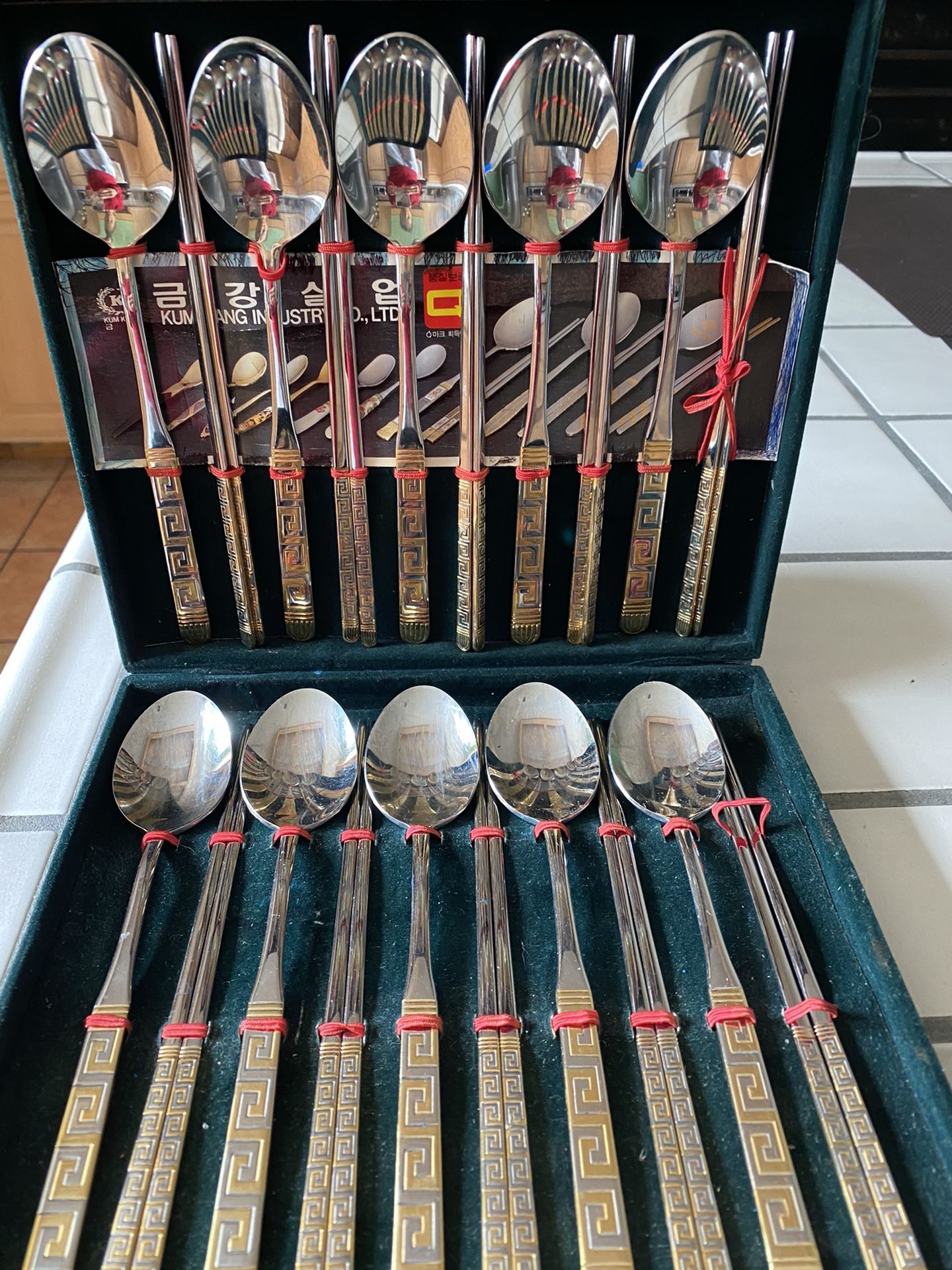 Gold and silver chop stick and spoon set brought back from Japan.