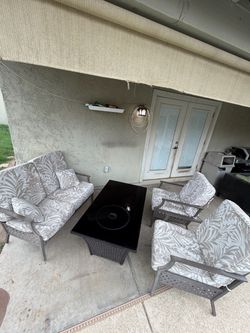 Delivery available! Complete 4-Piece Patio Furniture Set with Wicker Fire Pit Table