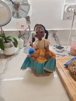 Mexican folk art, cloth and oil cloth doll.