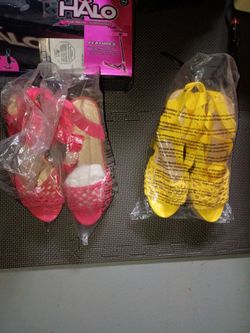 Shoedazzle yellow stacked leg strap heels.