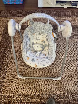 Battery powered baby swing