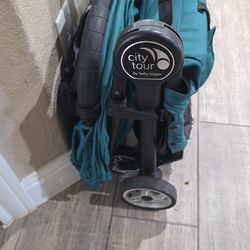 Compact stroller with bag