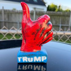 The Trump Thumbs Up Statue