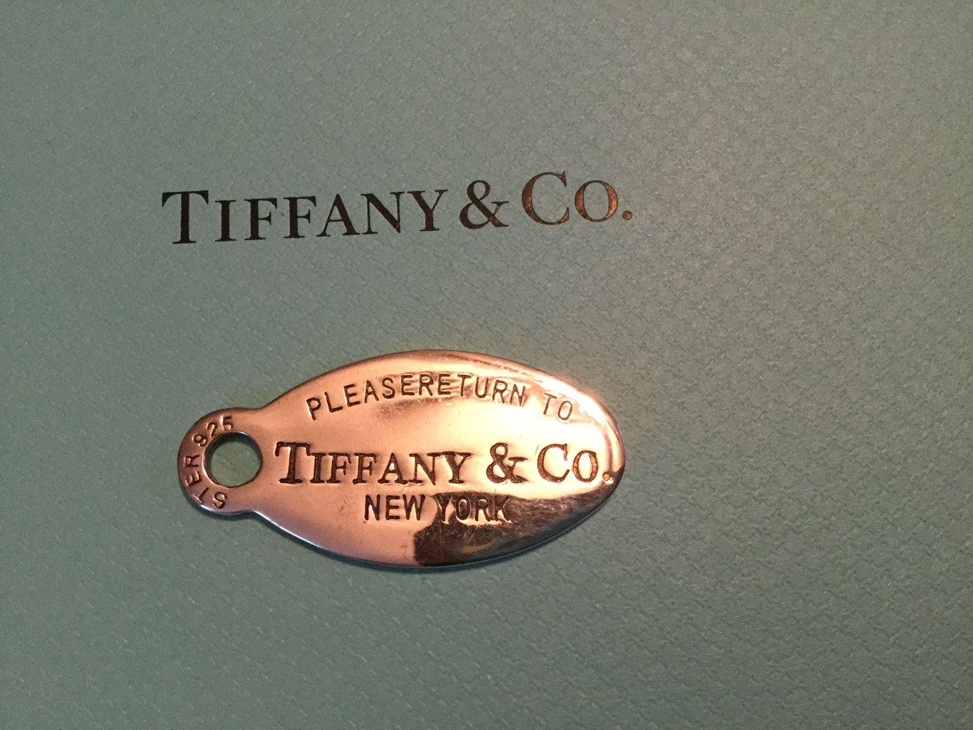Tiffany and Co Retired Charm 100% Solid Sterling Silver Asking $145.00 or Best Offer.