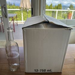 12 - Unused 750ml Clear Wine Bottles