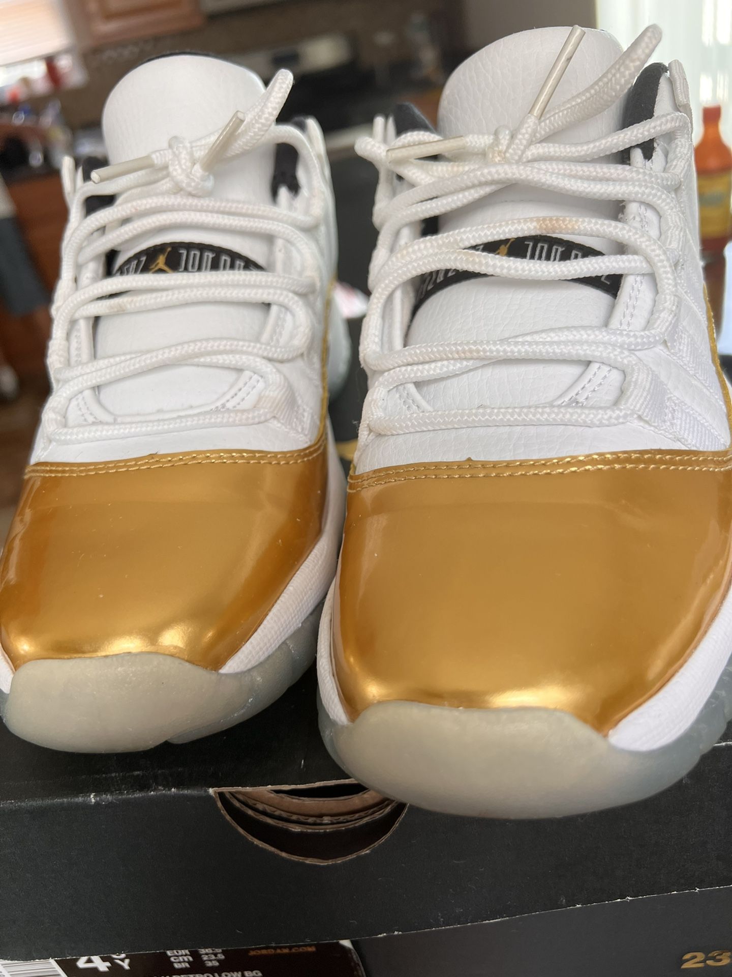 Jordan 11 Lows White And Metallic Gold Like New Size 4.5 BOYS Women s shoes