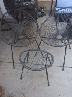 Wicker outdoor chairs and foot rest