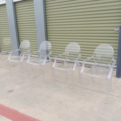 4 Clear Acrylic chairs in great condition overall 