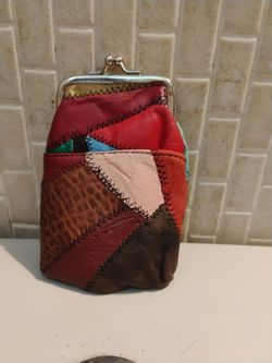Woman's 1960 cigarette/change purse. Leather and in mint condition.
