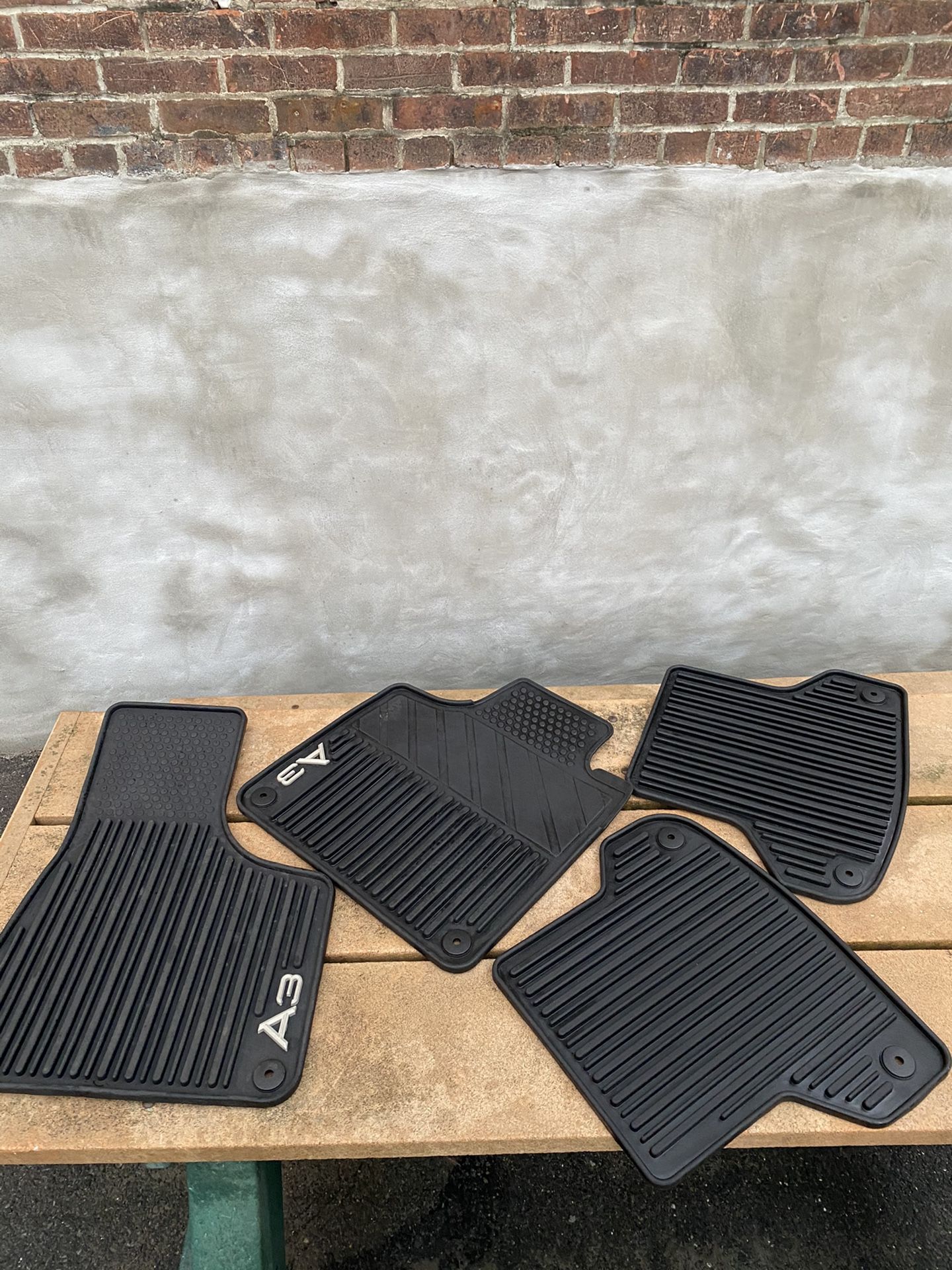 All-Weather Rubber Floor Mat - Set Of Four Extremely durable all weather mats featuring the A3 logo Including Audi Seatbelt Cover