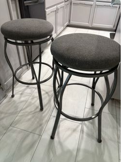 2 grey barstools