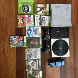 Xbox console and 2 controllers with DJ Hero and 10 games included