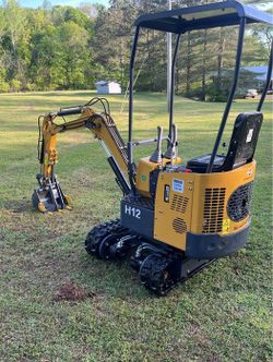 Tracked Excavator & Front Loaders 