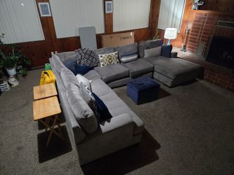 Large grey sectional couch