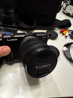 Camera for Sale: Panasonic Lumix DMC-GF2 with 2 Lenses, Bags and Accessories