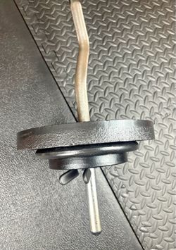 48 inches Steel Standard Barbell W/Weight Plates: 25s, 10s and 5s ponders. 93 # Brute W.
