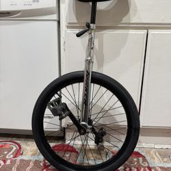 Used Silver colored Torker 20” Unicycle