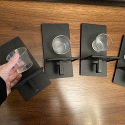 Four candle holders 