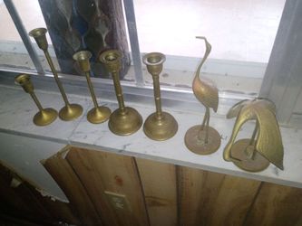 Vintage brass candle holders and a pair of brass birds