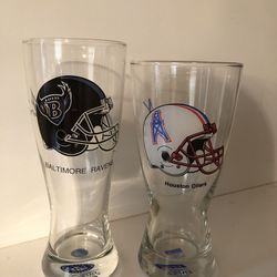 2 classic NFL logo beers glasses and 35 shot glasses.