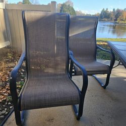 Two Textiline Patio Armchairs.