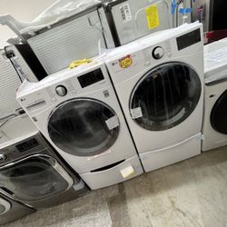 LG NEW WASHER WITH LAUNDRY PEDESTAL AND GAS DRYER WITH STORAGE PEDESTAL - SMART CONNECT