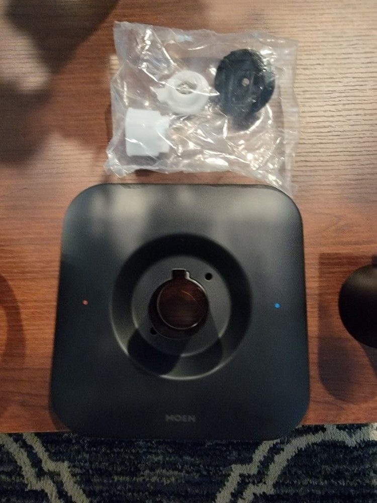 Moen Matte Black Shower Handle With Matching Pressure Valve.