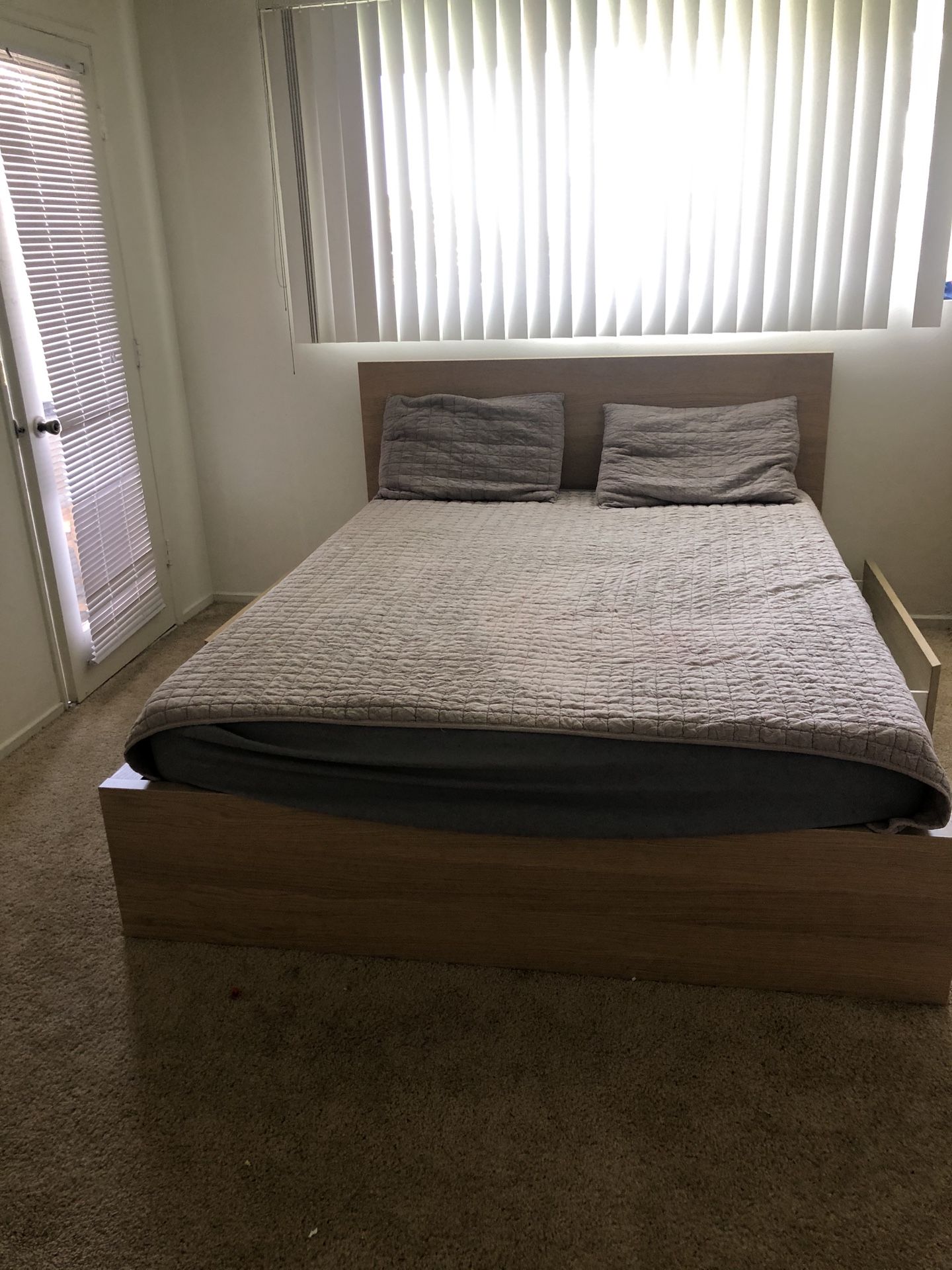 IKEA queen bed with storage drawers