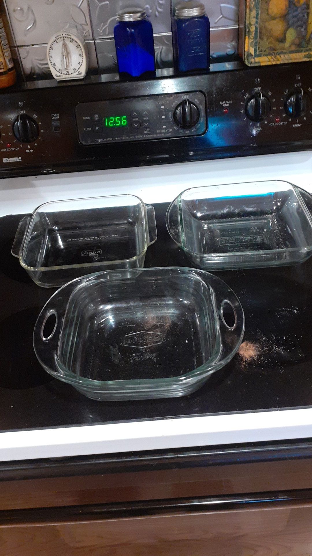 3 glass baking dishes 8by8