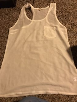 Blusas blanca , negra y café