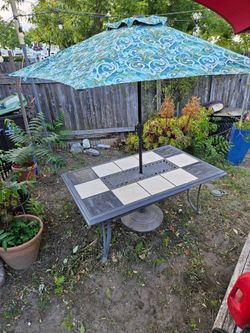 Outdoor table, umbrella with holder