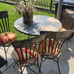 Wrought Iron And Stone Table With 4 Chairs