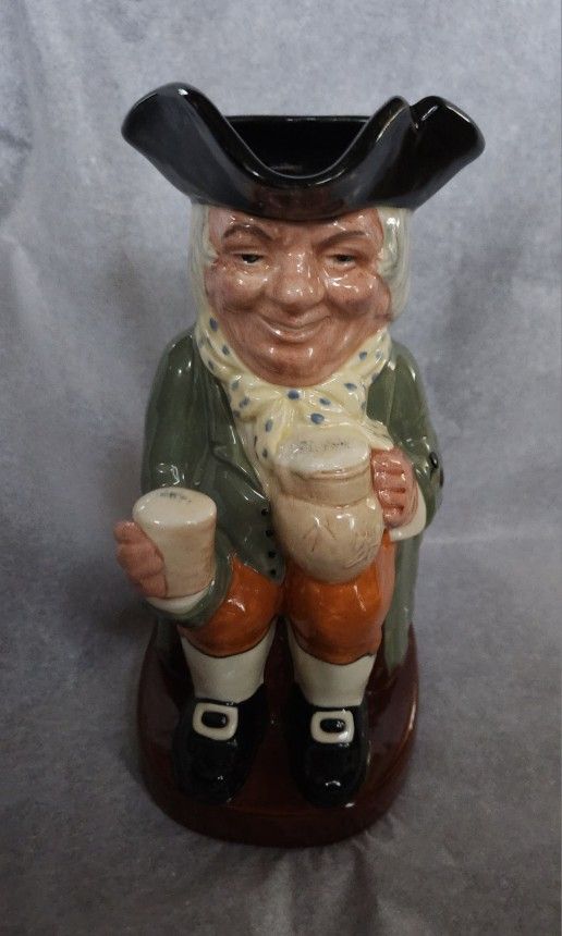 Royal Doulton Toby Mug Pitcher "Happy John" EUC $48 
Excellent Condition 
Pitcher with handle
8-1/2 inches tall 
Made in England