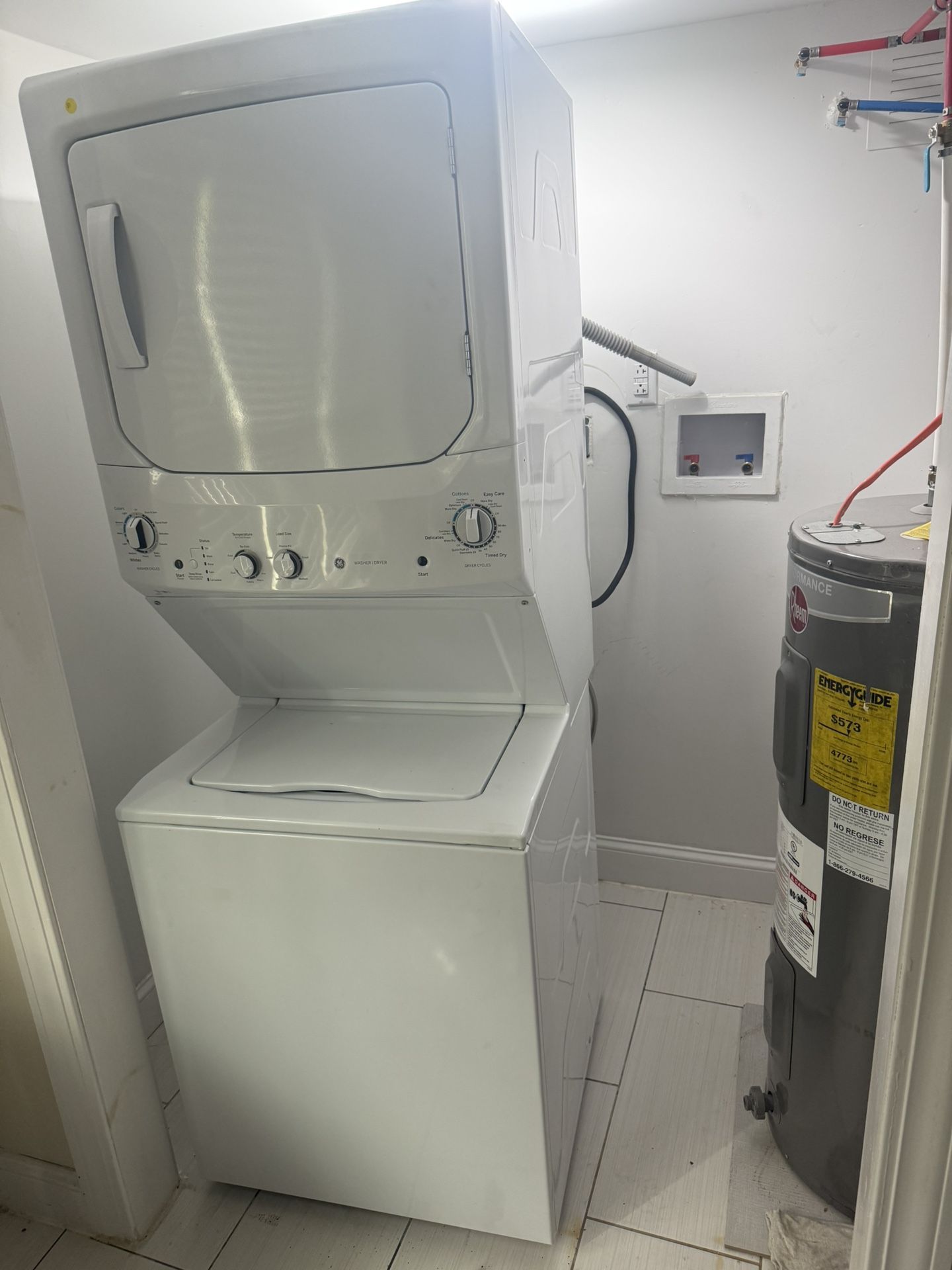 GE Stacked Laundry Center with 3.8-cu ft Top load Washer and Electric 5.9-cu ft Dryer
