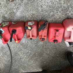 Six 1 Gallon Gas Cans