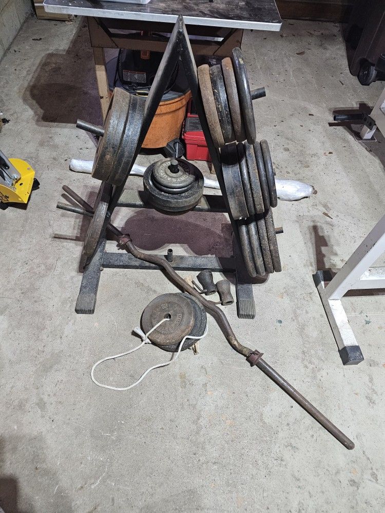 275lbs+ standard 1" weights + weight tree + curl