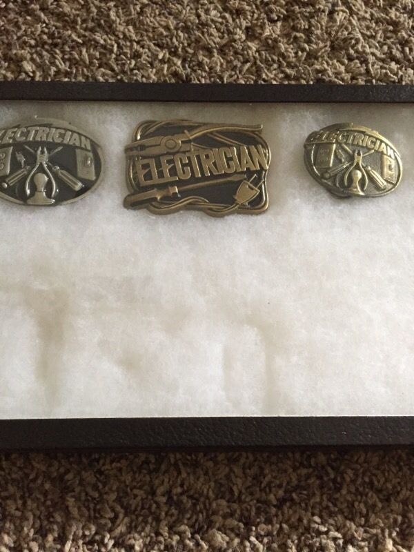 Electrician belt buckles