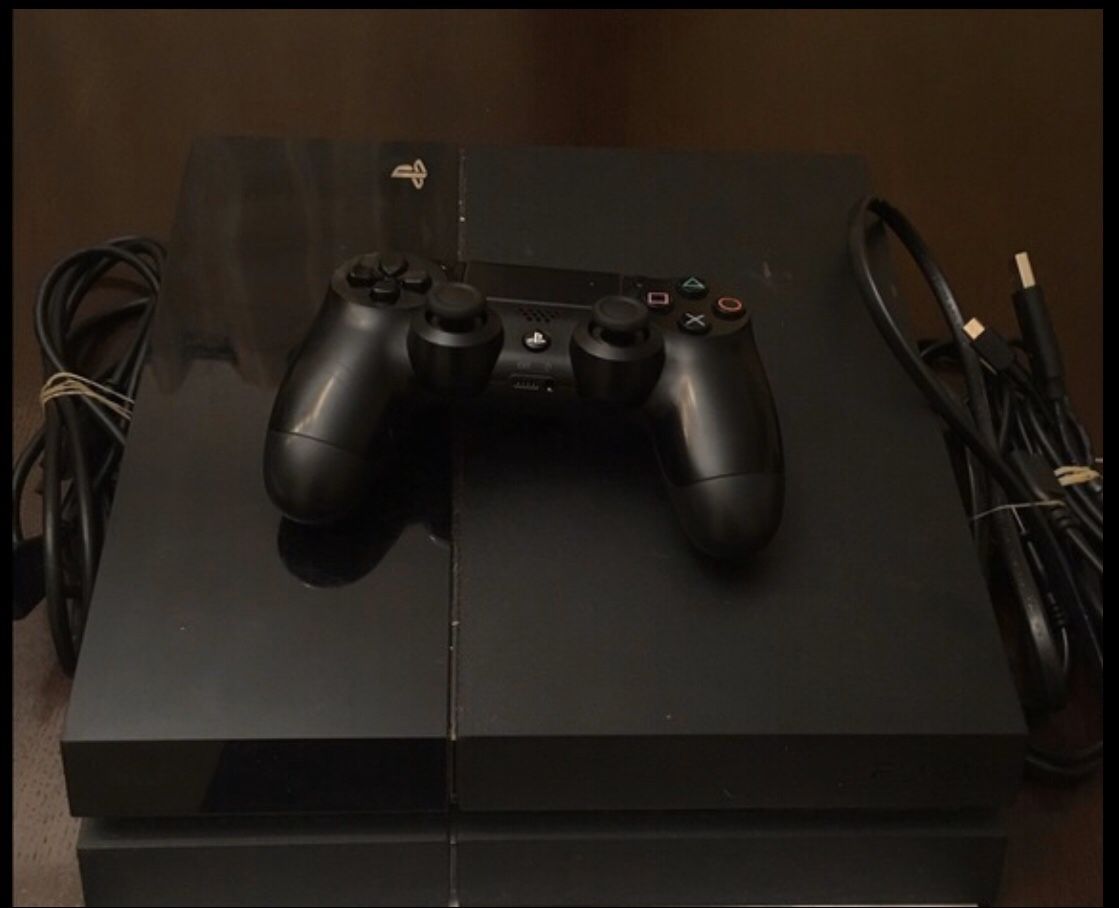 Black PS4 console & controller