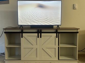 Tv stand + 40 inch smart TV + surround sound speaker